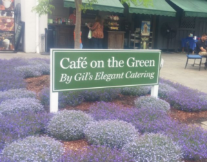cafe on the green store sign